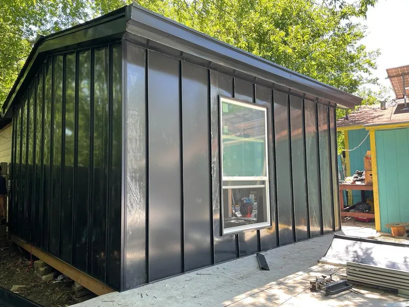 Black standing seam metal wall panels for Metal Roof Installation in McAlester