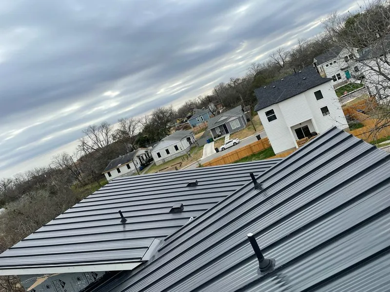 Standing seam metal roof panels with vents for Skylight Repair in McAlester